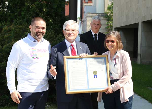 Binghamton Mayor Richard David presents Security Mutual Week Proclamation to Security Mutual Chairman and CEO Bruce W. Boyea.